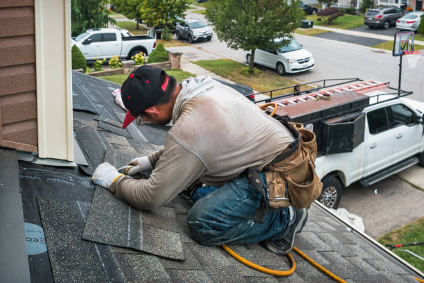 Professional Gutter Installation technician working in Milton, NY